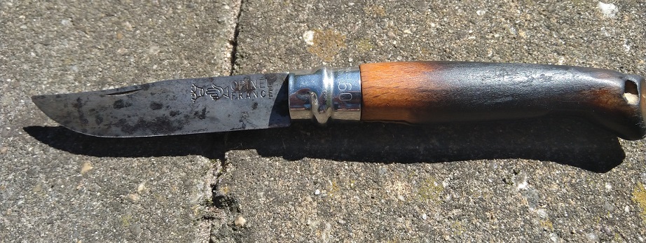 Opinel no 9 knife on stone